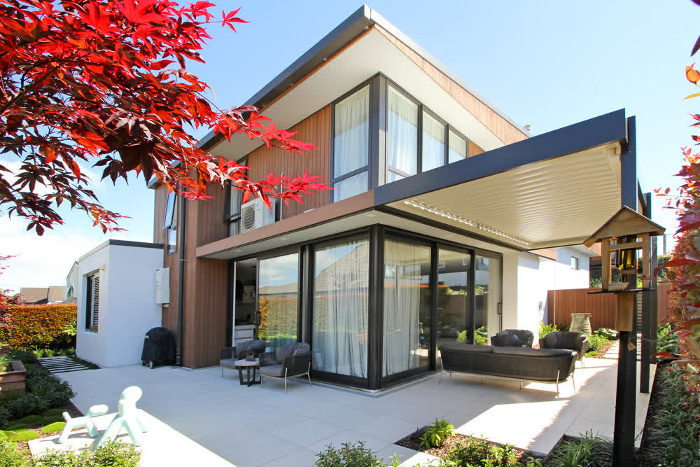 Cream paved entertainment and seating patio area